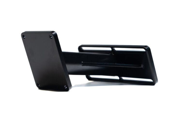 Novus handbrake mount side view with black metal bracket and reinforced mounting plate - Novus Racing Simulators