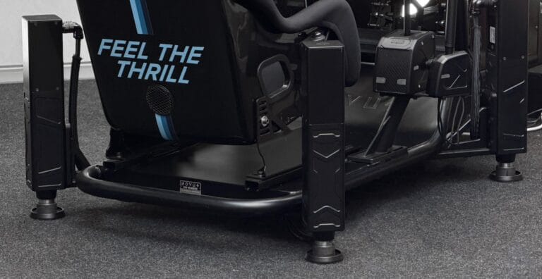 Rear view of Novus motion racing simulator showing racing seat and motion platform with Feel the Thrill branding