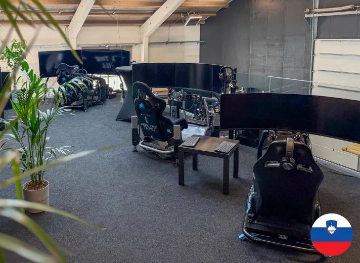 Novus racing simulator showroom in Žiri, Slovenia featuring multiple X Cage racing rigs with motion systems
